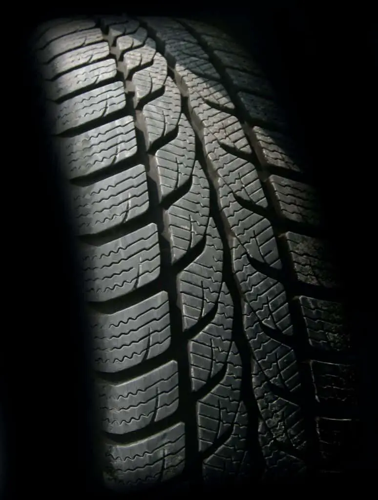 Tire in black background