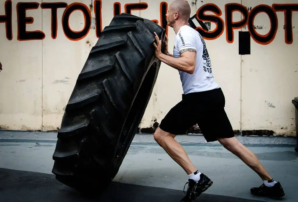 Man flipping tyre