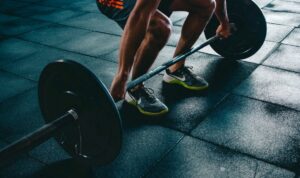 A person holding a barbell