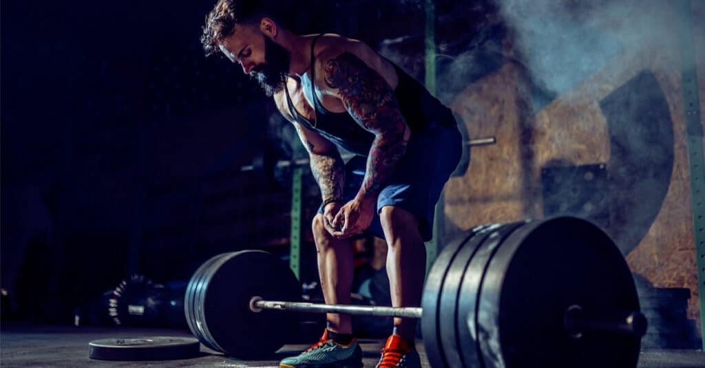 Muscular fitness man preparing to deadlift